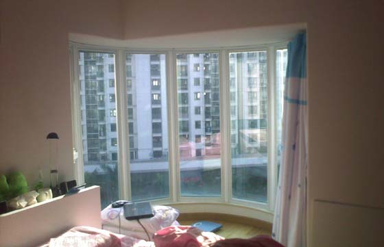 阳台半圆转角怎么装修效果图_小阳台装修效果_半圆形的阳台房子图片